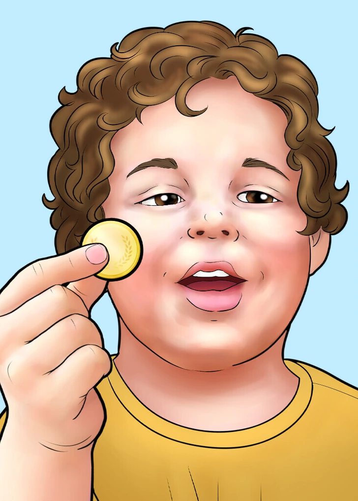 کودکی که سکه جایزه گرفته